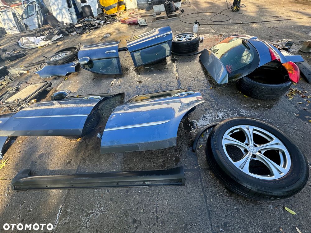 Subaru tribeca b9 maska osłona pod silnik lampy przód filtr obudowa filtra zderzak przód wzmocnienie górne pas belka przód chłodnica oleju chłodnica klimy zbiorniczek spryskiwaczy zawiasy maski błotnik prawy lewy węże wspomagania drzwi prawe lewe przednie tylne progi felgi koła klapa tył lampy tył belka tył zderzak tył - 7