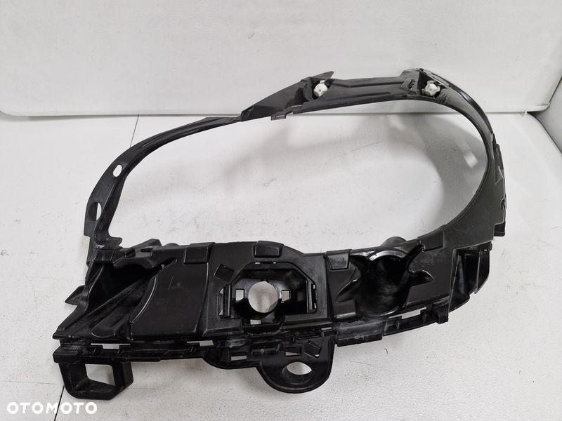 BMW X5 E70 LIFT ŚLIZG UCHWYT WZMOCNIENIE BŁOTNIKA LEWY PRZÓD 7222973 - 1