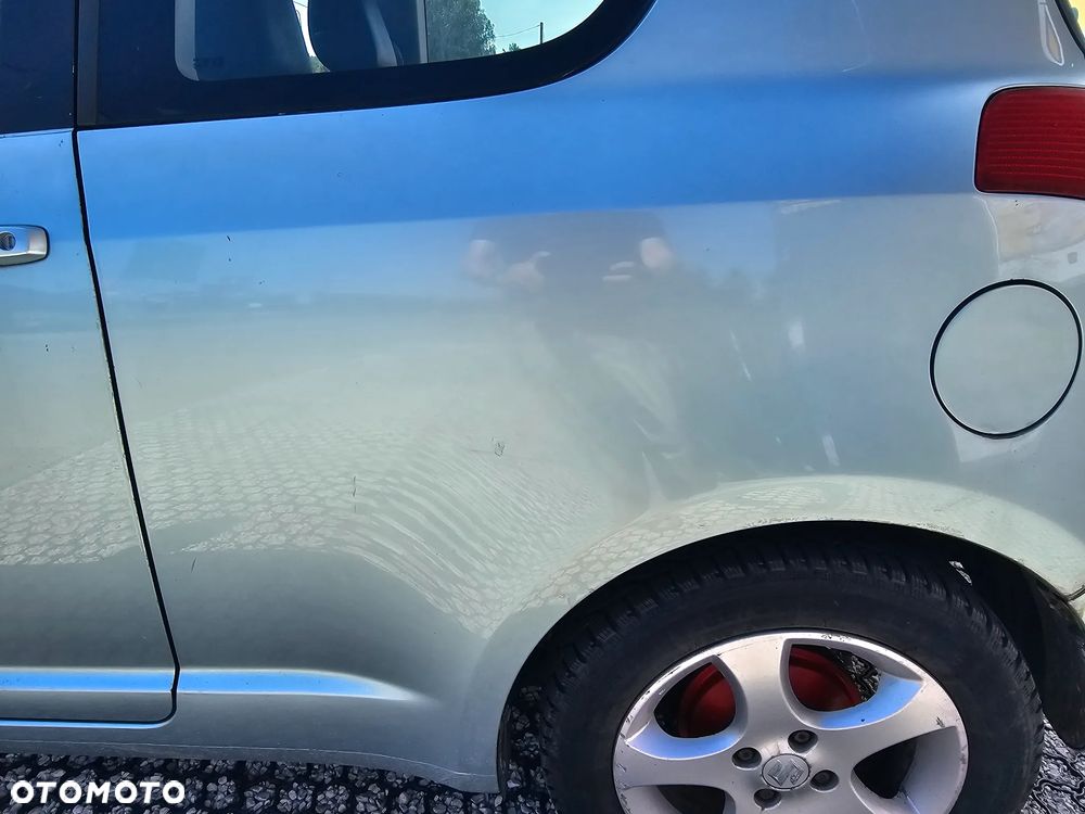 Suzuki Swift 1.3 DDiS 16v GLX - 24
