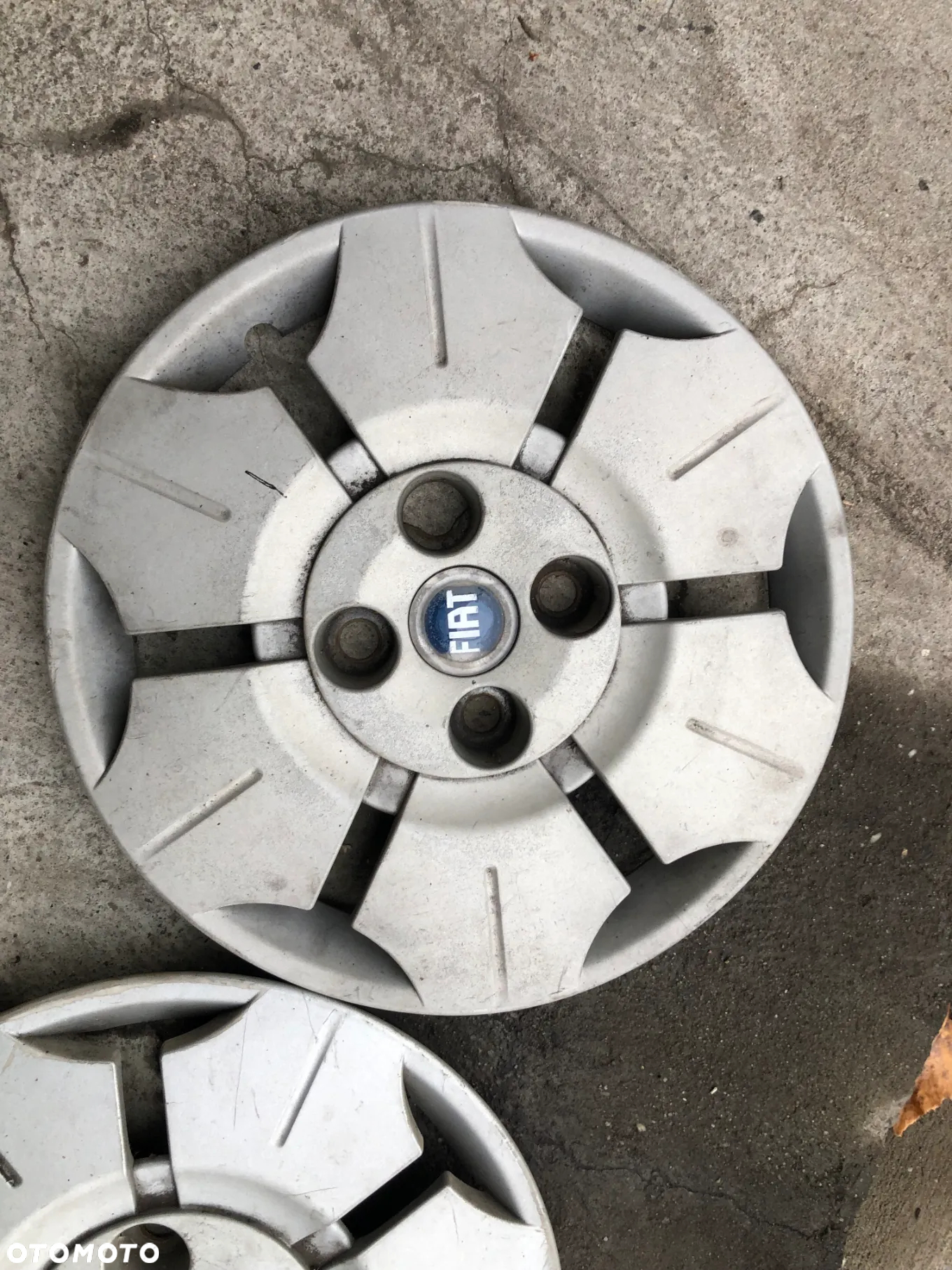 Kołpaki Oryginalne R13 Fiat Panda II Komplet 7353742290 (2003–2012)- Gwarancja Wysyłka - 7