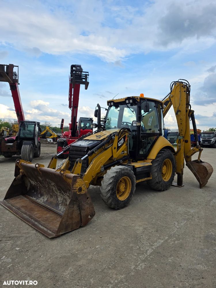 Cat Caterpillar 428F 2014 buldoexcavator buldo compact - 1