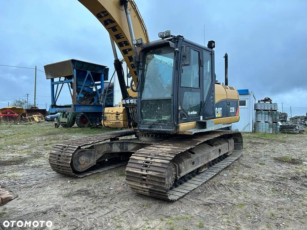 Caterpillar CAT 323D - 4