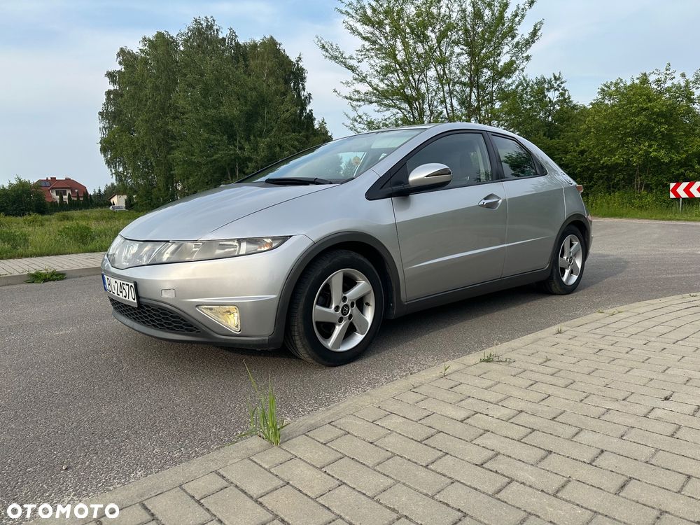 Honda Civic 1.4i-DSi Comfort - 1