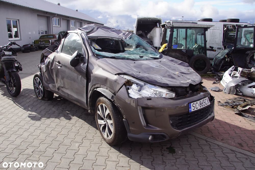 Auto na części - Citroen C4 Aircross 1.6 HDI 114 KM 9H05 F6MBC1ABZ KTZ 2015R Silnik Skrzynia Drzwi Błotnik Szyba Lusterko Klamka Lampa Deska Kokpit Sterownik Moduł Czujnik Licznik Kierownica Panel - 1