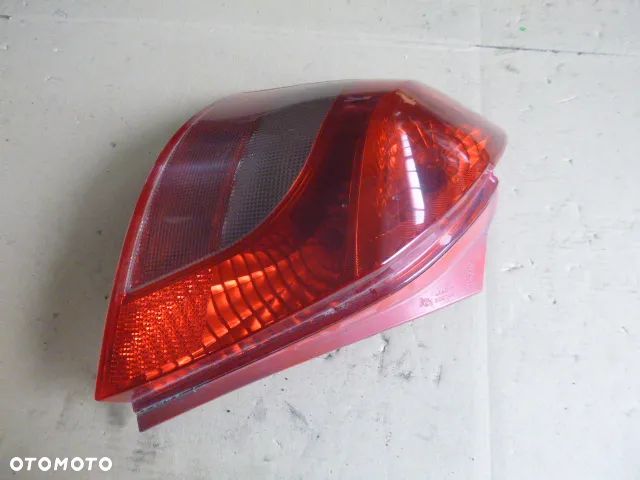 LAMPA LEWY TYŁ LEWA TYLNA TOYOTA YARIS II 5D 05-09 - 5