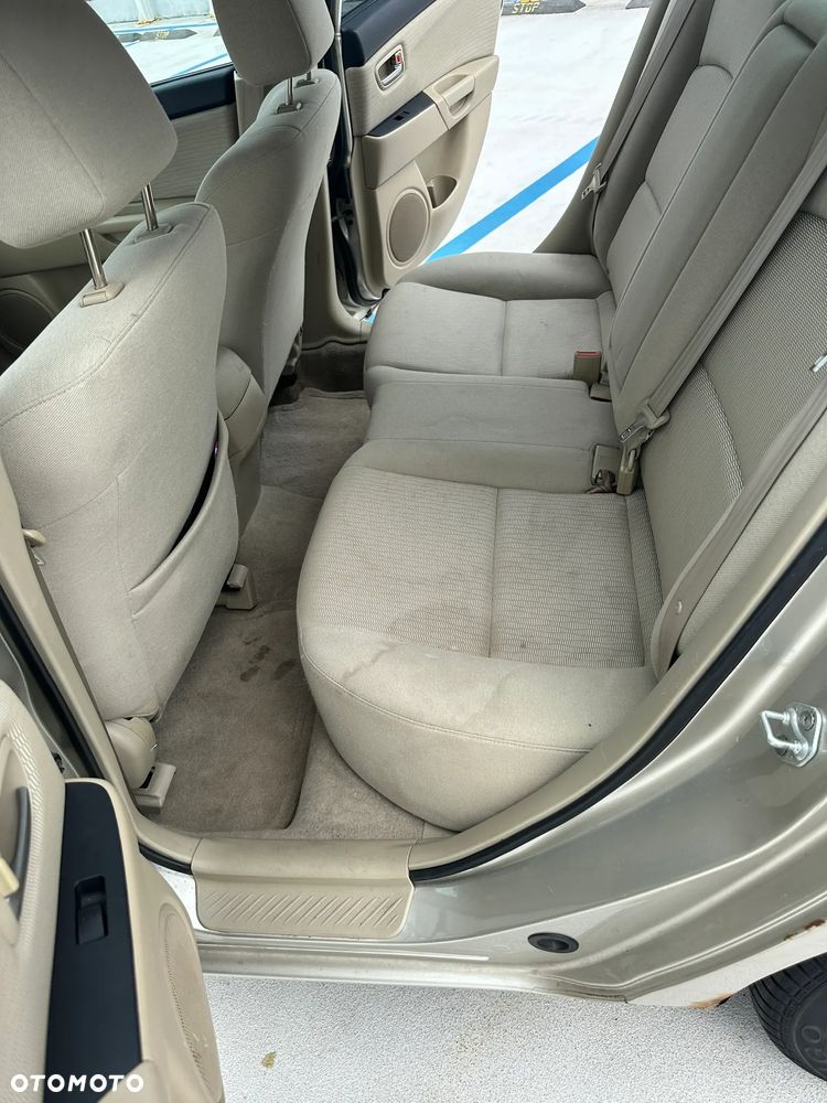 Mazda 3 2.0 Exclusive + - 21