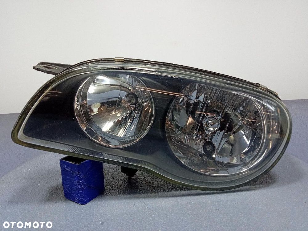 TOYOTA COROLLA E11 LIFT 99-02 REFLEKTOR LEWY LAMPA EU 20-5954 - 1
