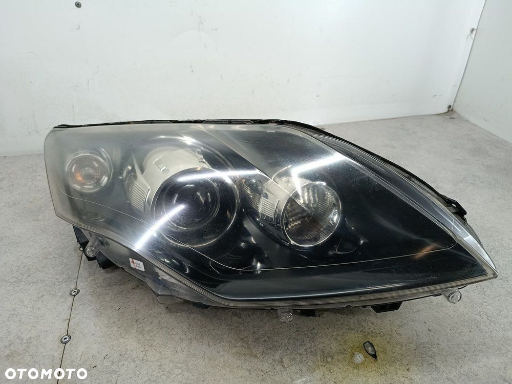 LAMPA PRZÓD PRAWA XENON RENAULT LAGUNA III 260100043R 89902279 89034934 - 2
