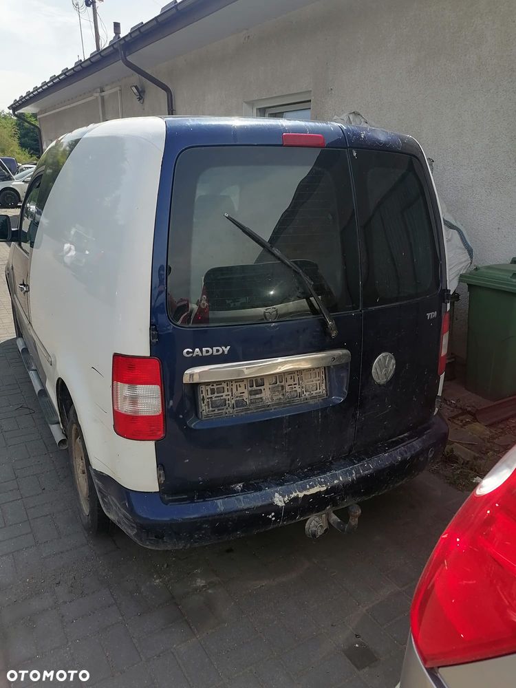 Volkswagen Caddy III (03-10r.) 1.9D 104KM. Silnik BJB Skrzynia GQR lakier LD5Q  D5Q.Cały na części.GWARANCJA !!! Przód Tył Zestaw Komplet Drzwi Klapa Zderzak Błotnik Maska Grill Atrapa Szyba Pas Lampa Lusterko Boczki Fotel Kanapa Kokpit Deska Rozdzielcza Przełącznik Włącznik Sterownik Przewody Wiązka Instalacja Moduł Komputer Czujnik Listwa Pompa Alternator Wtryski Głowica Rozrusznik Kompresor Sprzęgło Dwumas Silnik Skrzynia ABS Klimatyzacji Paliwa Wspomagania Kolektor Turbina Przepustnica Zawór Chłodnica Koło Hak Belka Sanki Zawieszenie Mcpherson Półoś Amortyzator Wydech Tłumik Zacisk Most - 5