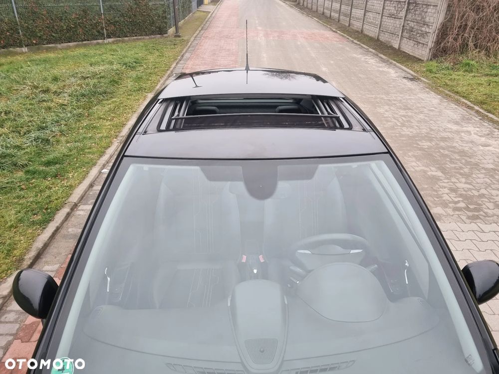 Opel Corsa 1.4 16V Cosmo - 16