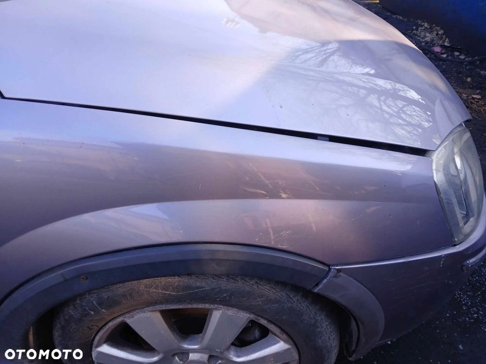 Opel Corsa C Błotnik prawy,  kod lakieru Z166 - 2