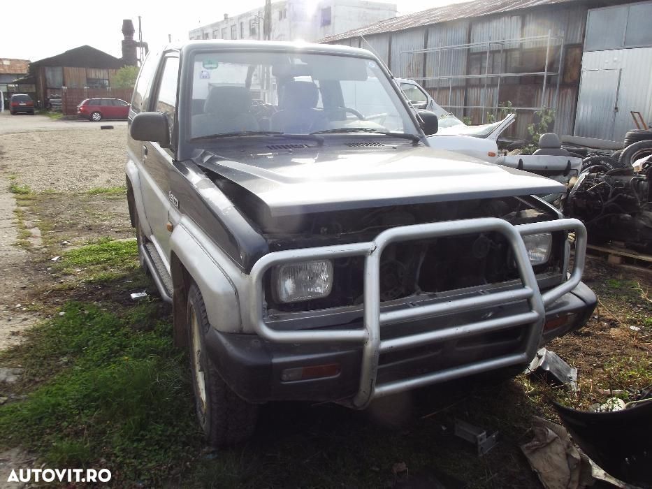 Dezmembrez Daihatsu Feroza 1.6 16v carlig bullbar piese scaune - 1