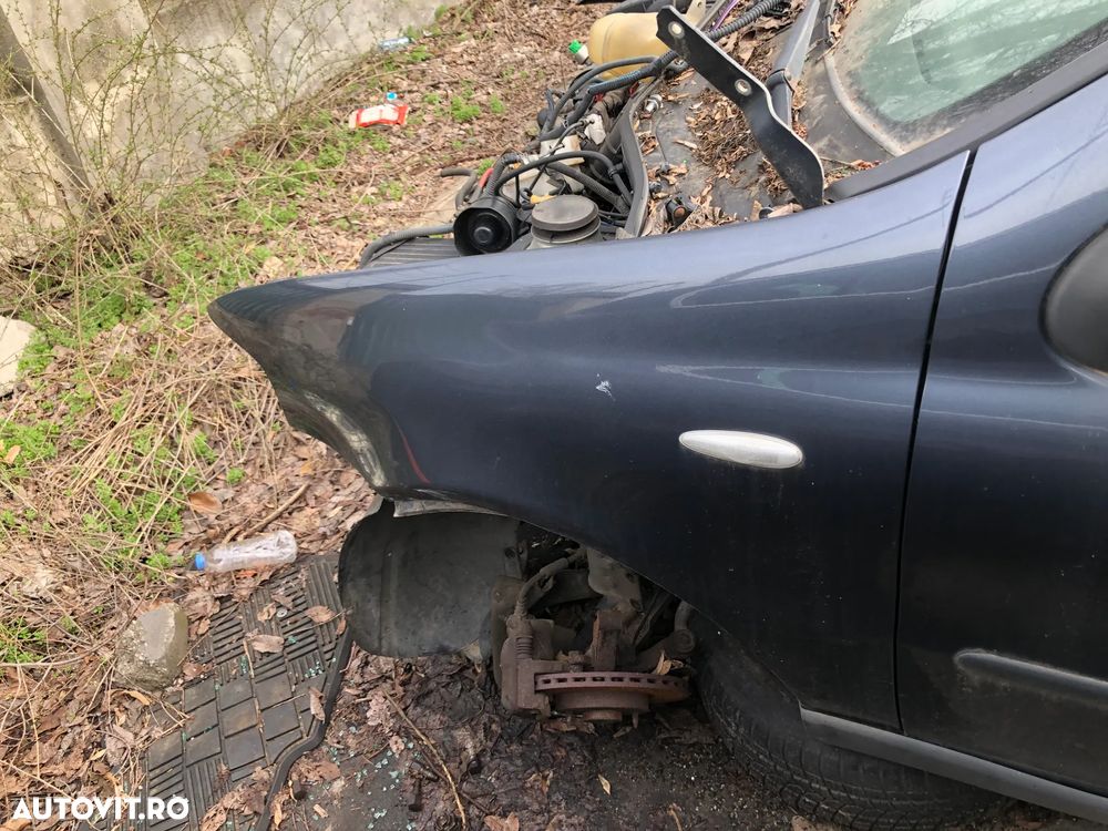 Aripa stanga fata Fiat Albea gri inchis 2005 - 1