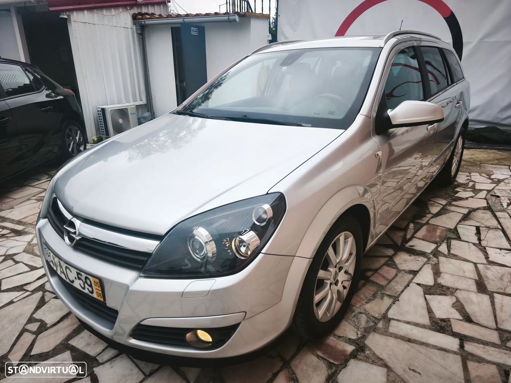 Opel Astra Caravan 1.9 CDTi Cosmo - 33