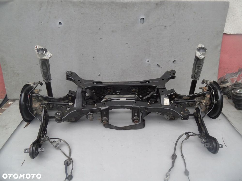 OŚ TYLNA BELKA TYŁ SANKI ZAWIESZENIE HYUNDAI TUCSON II SPORTAGE IV 4X4 4WD