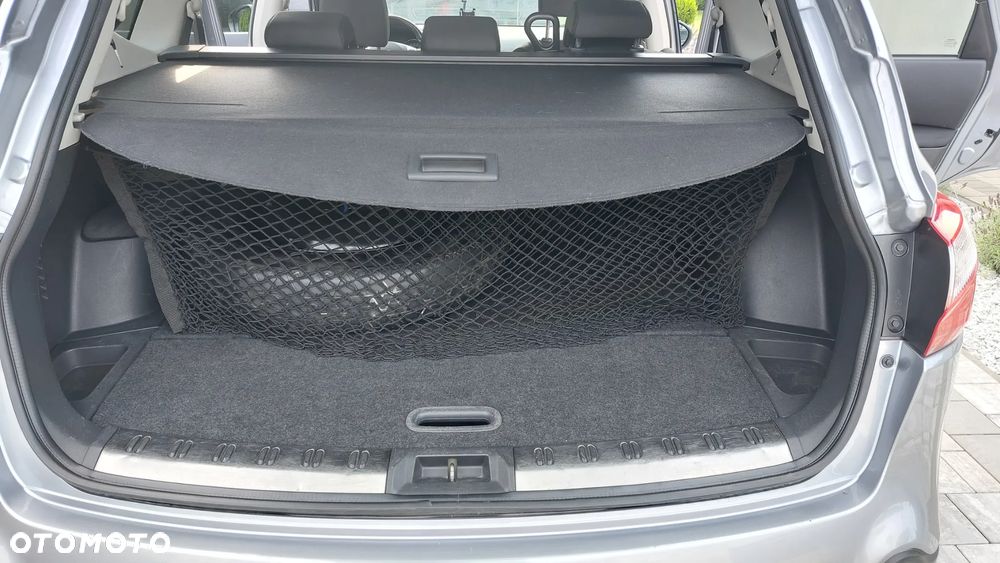 Nissan Qashqai+2 - 12