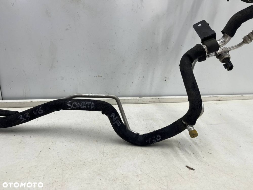 Rura Hyundai Sonata NF V 04-11r. 3.3 V6 benzyna przewód wąż klimatyzacji f108-dc4aa-01 - 3