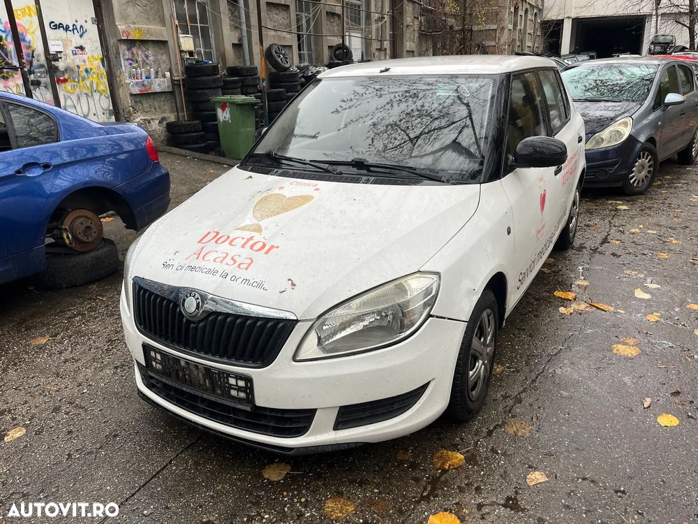 Dezmembrez Skoda Fabia II facelift alb 2011 1,2 benzina - 2