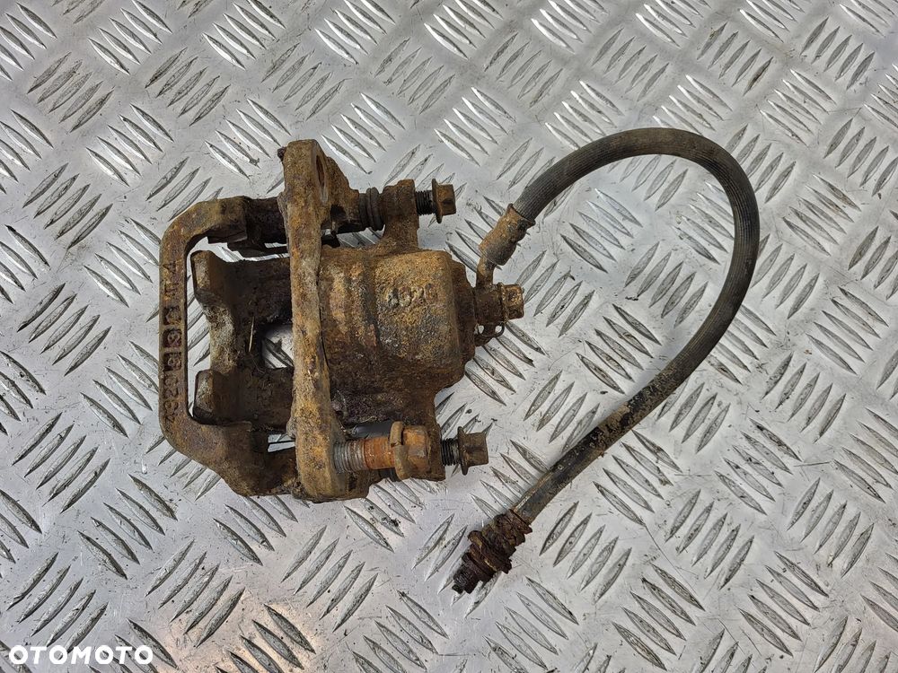 Suzuki Grand Vitara II 1.9 DDIS Zacisk Jarzmo Hamulcowe Tył - 5