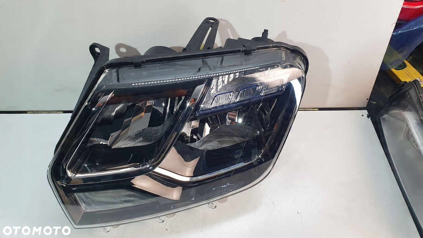 Dacia Duster 1 I Lift 13-17 prawa lampa przednia przód reflektor € - 4