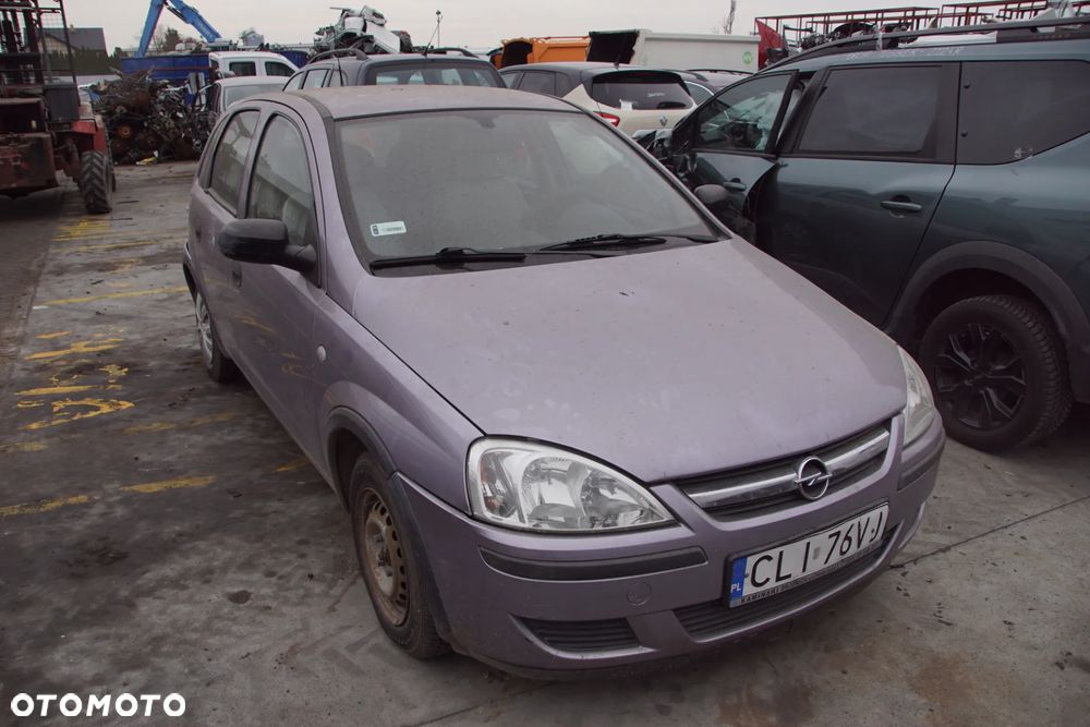 Auto na części - Opel Corsa C Lift 1.2 80 KM Z12XEP F13 4OU 2004R Silnik Skrzynia Drzwi Maska Błotnik Klapa Zderzak Lusterko Lampa Klamka Szyba Deska Kokpit Sterownik Moduł Czujnik Licznik Panel Wyświetlacz Kierownica - 9