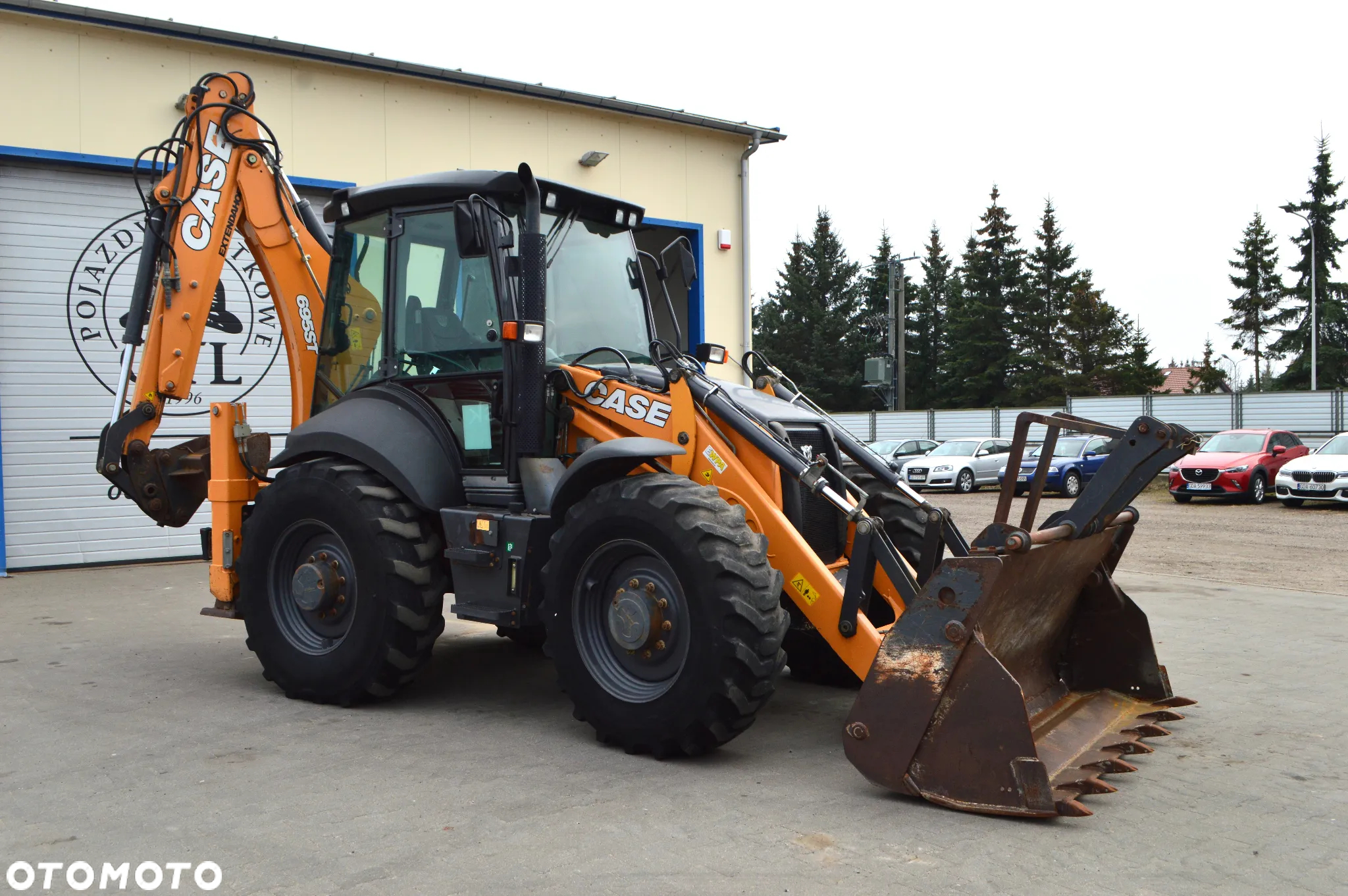 Case 695ST - 8