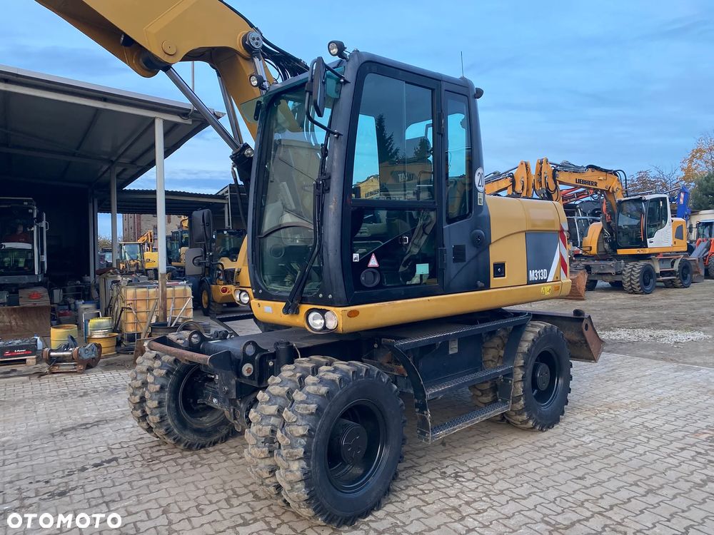 Caterpillar CAT M313D, 7500 MTH, 2015 ROK, Z NIEMIEC, - 11