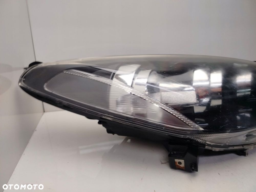 mazda 2 de 2011r reflektor lampa prawy przód prawa przednia soczewka - 4