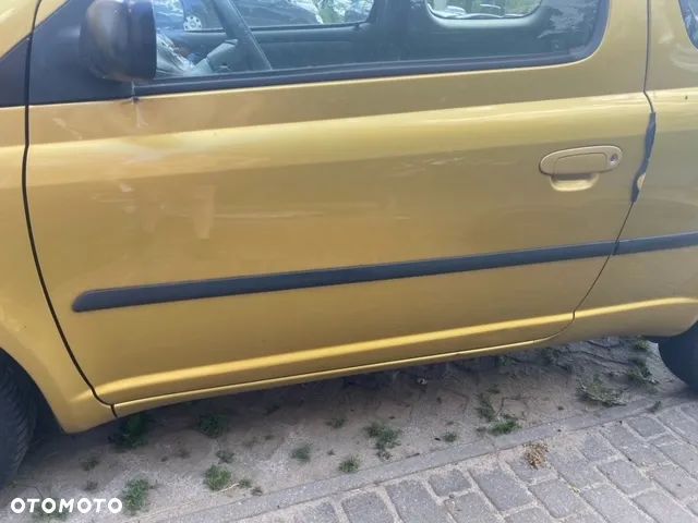 DRZWI LEWE PRAWE TOYOTA YARIS I 580 - 2