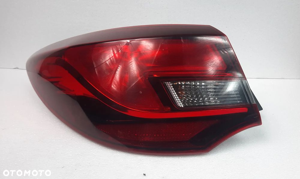 OPEL ASTRA J SEDAN LAMPA TYLNIA PRAWA  25870154 25870153 - 7