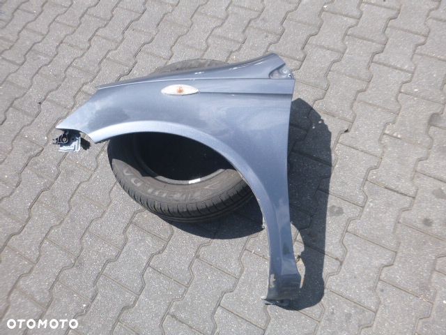 BŁOTNIK LEWY PRZÓD LEWY PRZEDNI TOYOTA YARIS I LIFT KOLOR 855 - 1