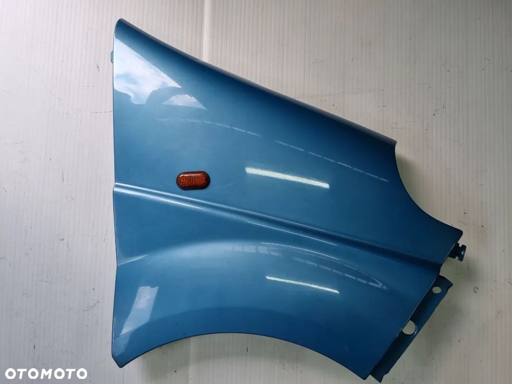 BŁOTNIK PRAWY TRAFIC VIVARO 01-14r.  TEF41 - 1