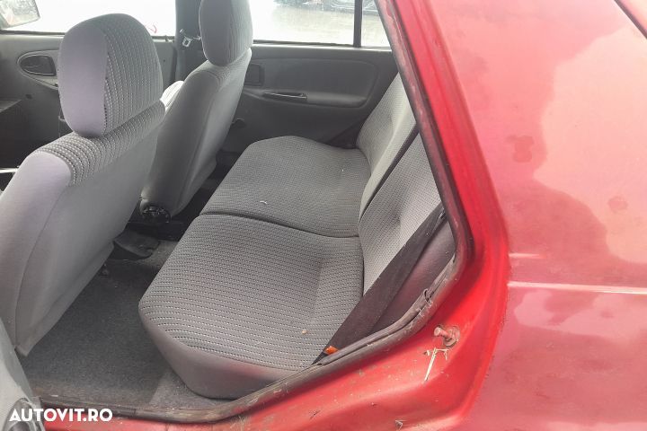 Dezmembrez Dacia SuperNova 1 [2000 - 2003] liftback 1.4 MPI MT (75 hp - 6