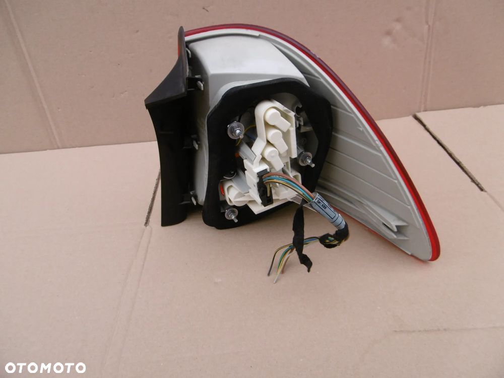 lampa tył tylna lewa bmw e91 lci lift polift w błotnik 7289431 - 7