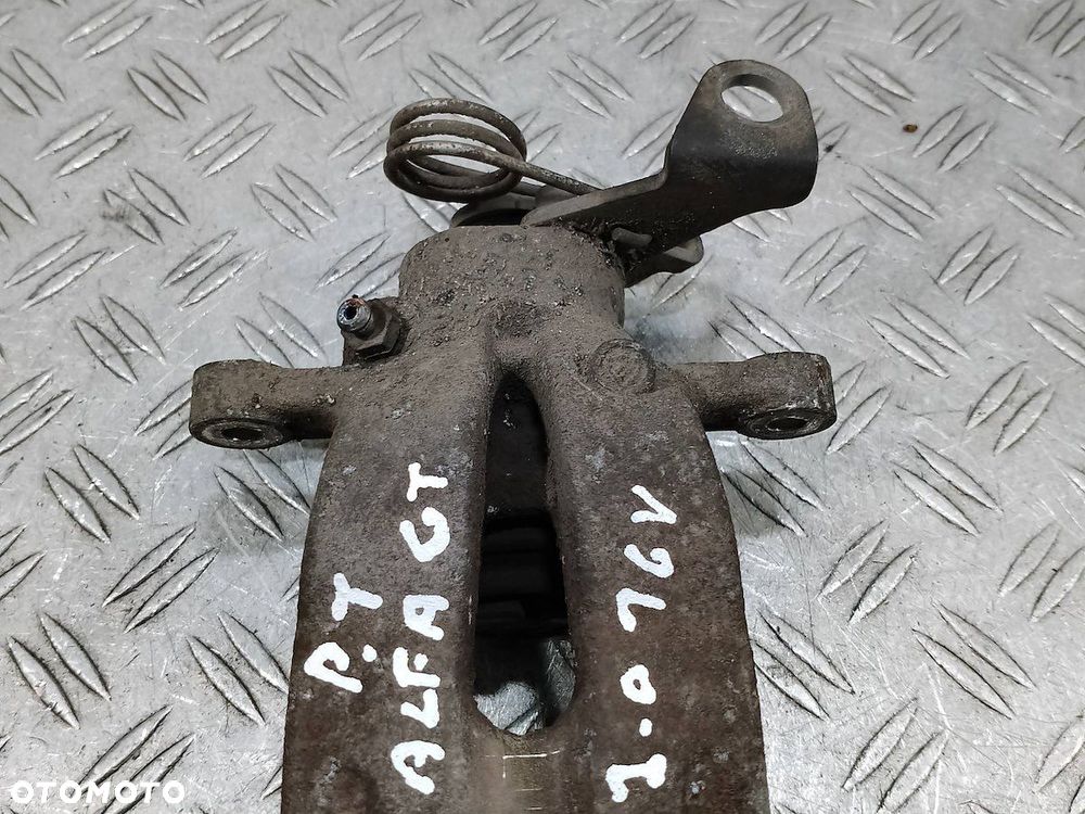 ZACISK HAMULCOWY PRAWY TYŁ ALFA ROMEO GT 2.0 16V - 1