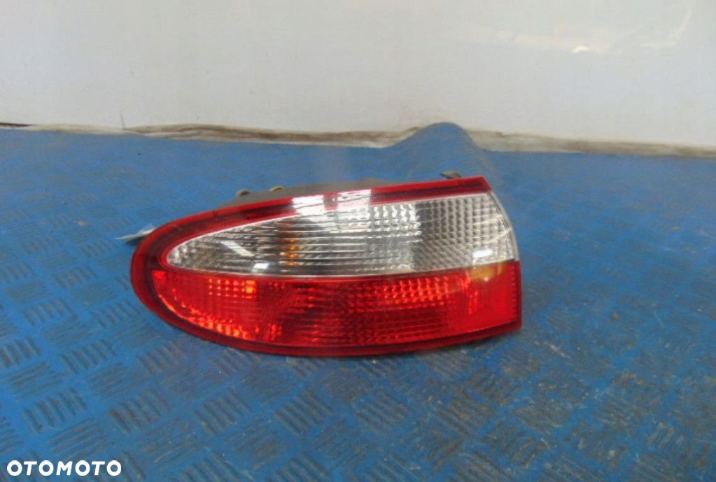 DAEWOO LANOS LAMPA TYLNA LEWA - 1