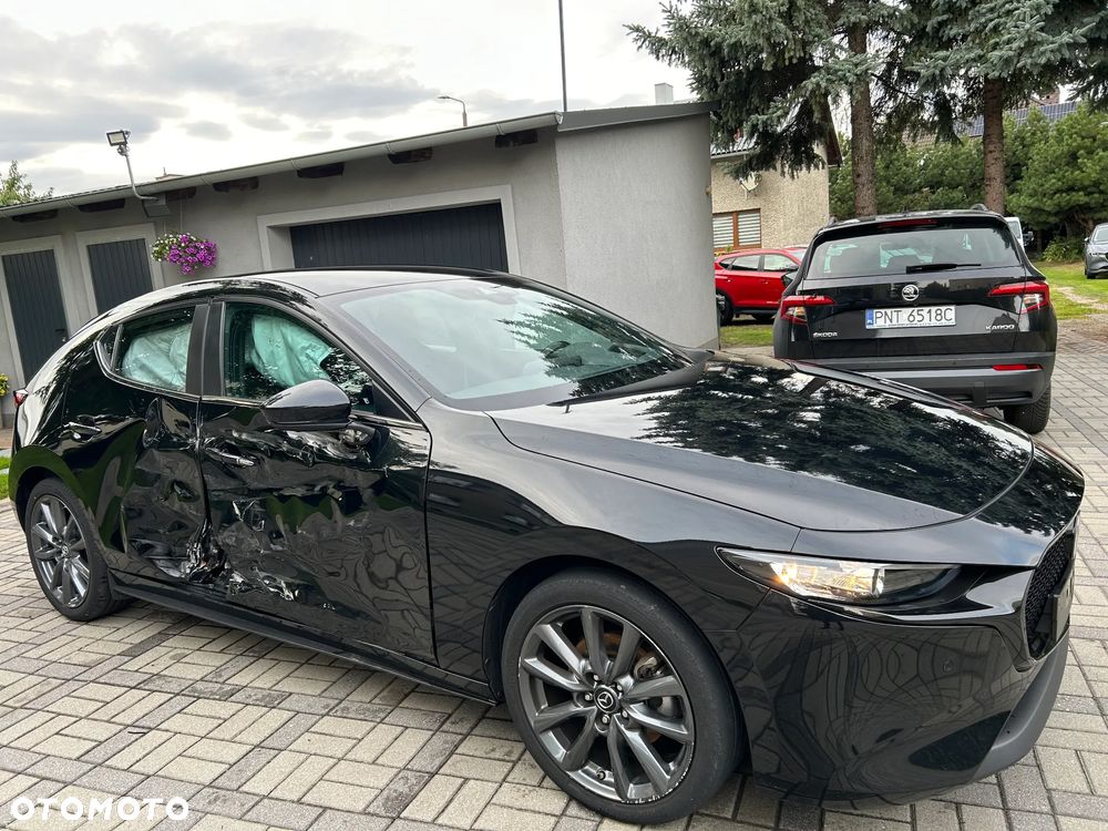 Mazda 3 2.0 mHEV Exclusive Line - 4