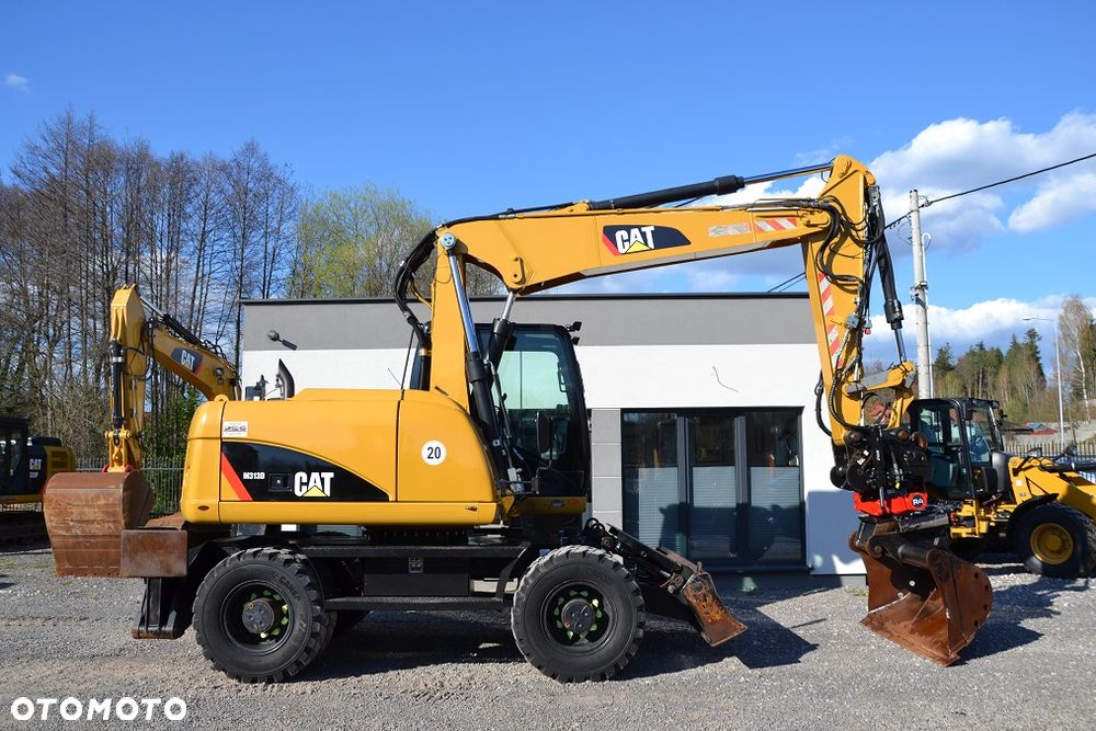 Caterpillar M 313 D, ROTOTILT - 12