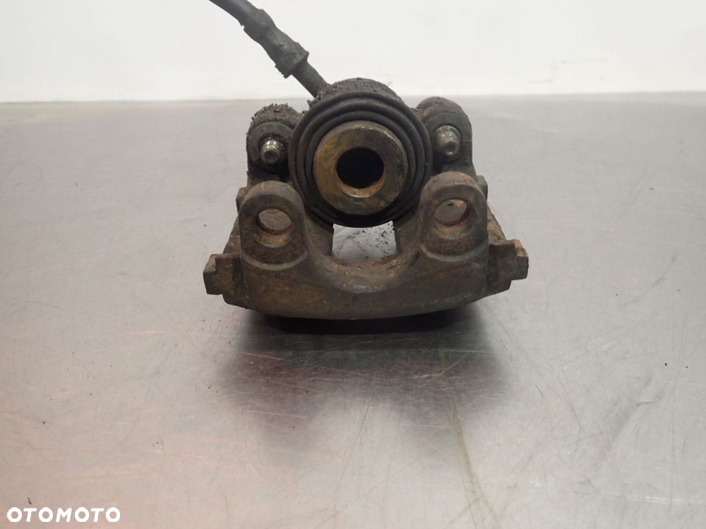 ZACISK HAMULCA LEWY TYŁ BMW E36 - 4