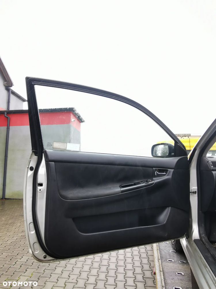 Drzwi prawe Toyota Corolla E12 2004r 3D - 4