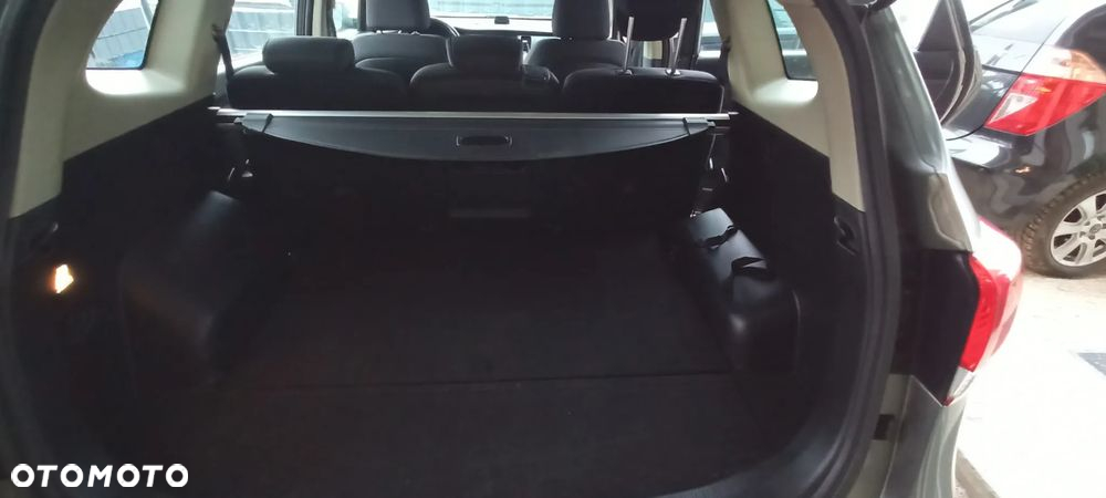 Kia Carens 1.7 CRDi M - 9