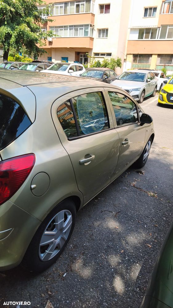 Opel Corsa 1.2i Cosmo - 10