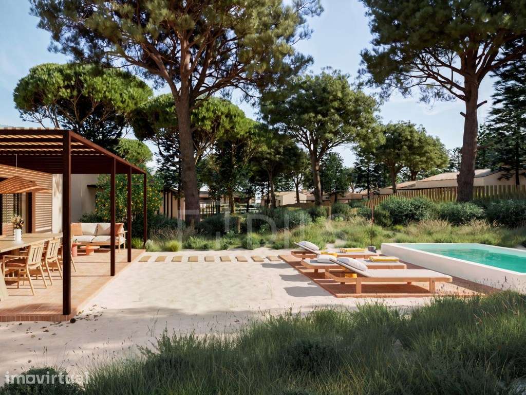 Moradia T2 com jardim e estacionamento inserida na Aldeia da Muda - Grande imagem: 2/40