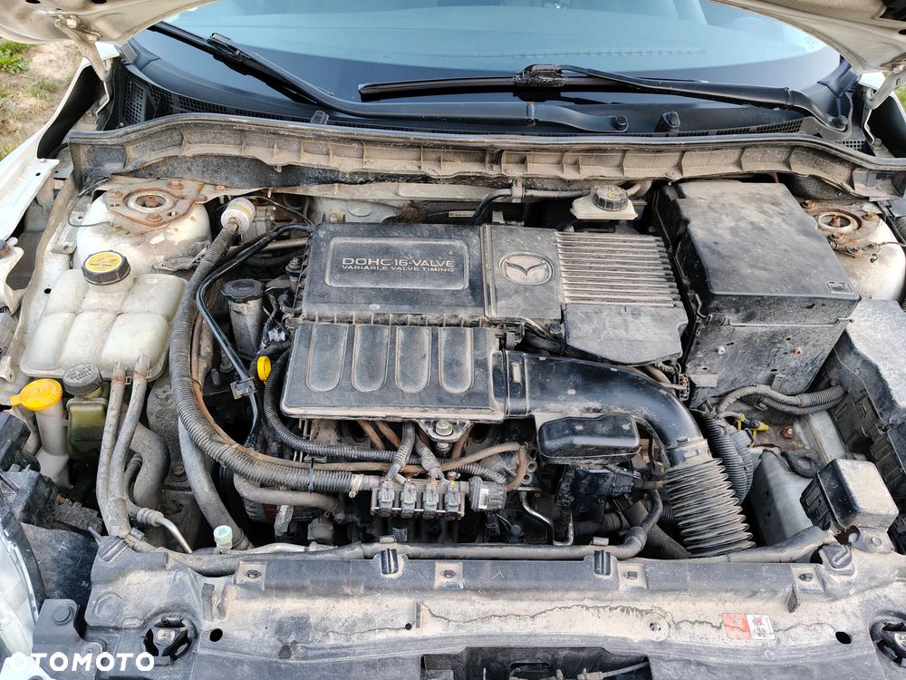 Mazda 3 1.6 Exclusive + - 5