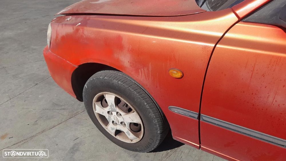 Guarda-lamas esquerdo HYUNDAI Accent II (LC) - 1