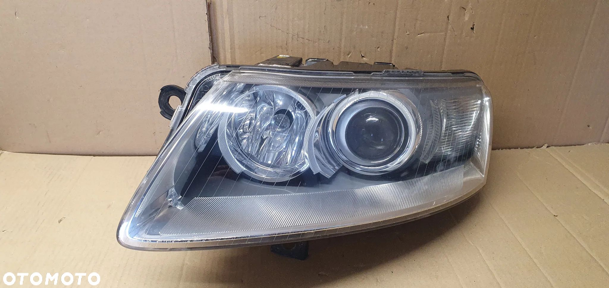 Lampa lewy przód przednia lewa BI XENON Audi A6 C6 4F0941003AK - 1