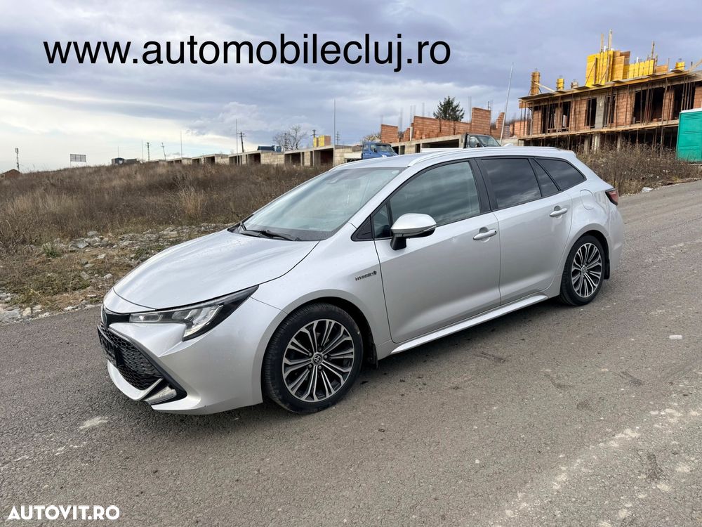 Toyota Corolla 1.8 HSD Business - 32