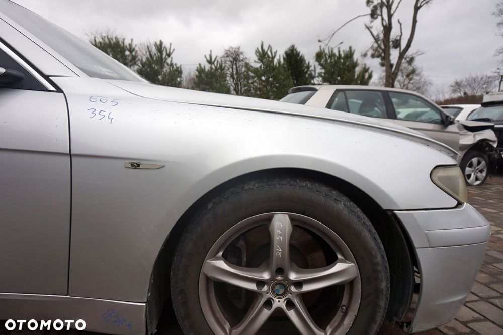 BŁOTNIK PRZEDNI PRAWY 7 IV E65 354  SREBRNY TITANSILBER BMW 2001-2005 - 1