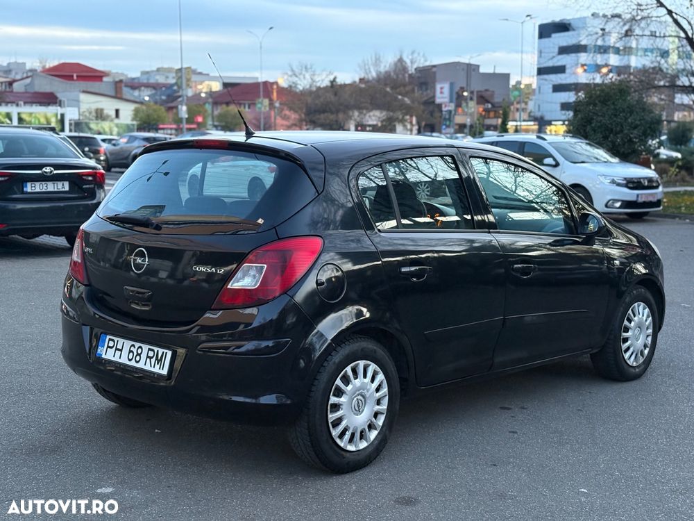 Opel Corsa 1.2i Cosmo - 8