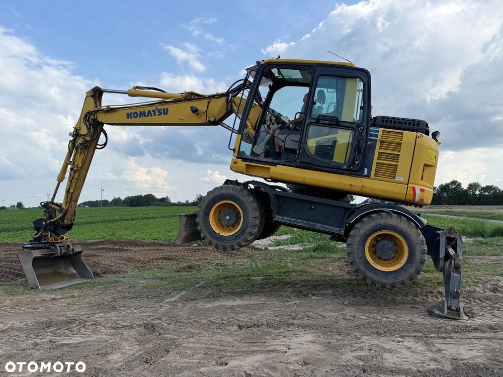 Komatsu Koparka kołowa Komatsu PW 148 Pług podpory Klima Centralne smarowanie Rototil Ramię 2 razy łamane PIĘKNA - 6
